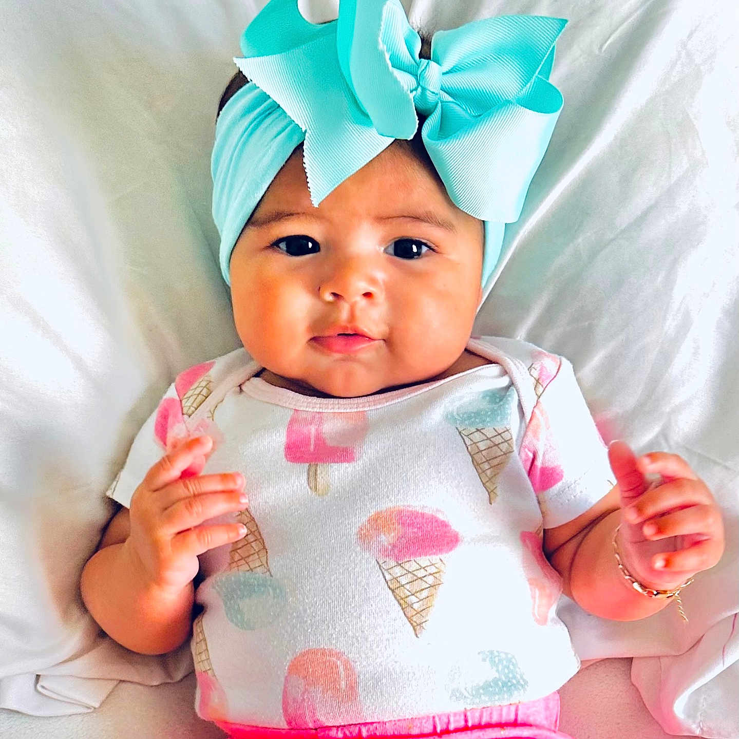Lluvia joined the competition — help win amazing prizes! accessories, baby, bodypart, bonnet, cap, clothing, face, finger, hand, happy, hat, head, headband, newborn, pants, person, photography, portrait, sleeve, smile