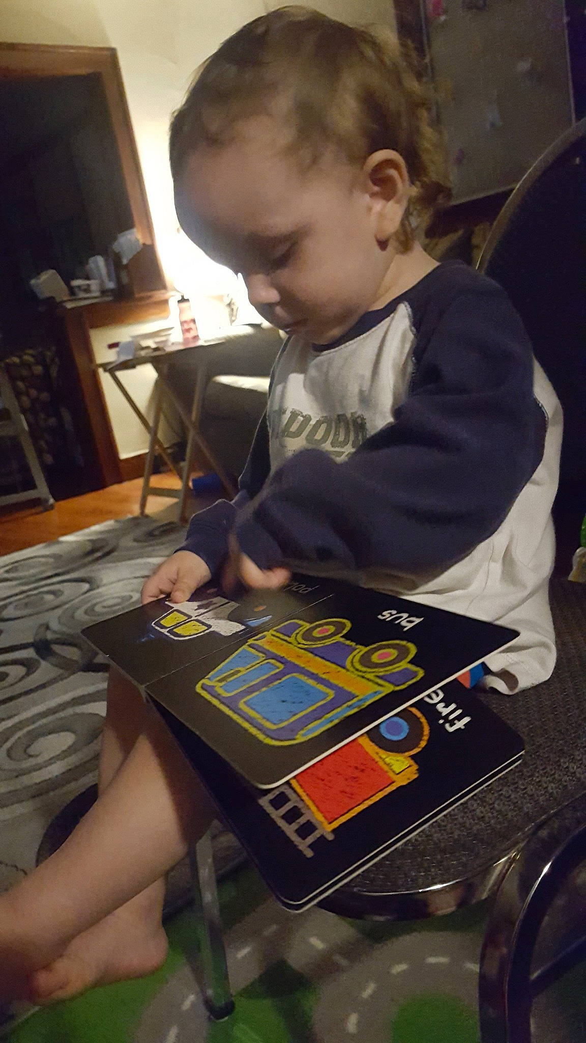 Elisha is registered to the contest to win money with this photo: child, games, learning, person, play, reading, toddler