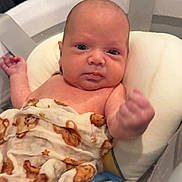 Ronnie joined the competition — help win amazing prizes! animal_print, baby, bath, bathtub, blue_eyes, child, comfort, cushion, cute, expression, face, fist, hand, indoors, infant, newborn, skin, towel, water, wet