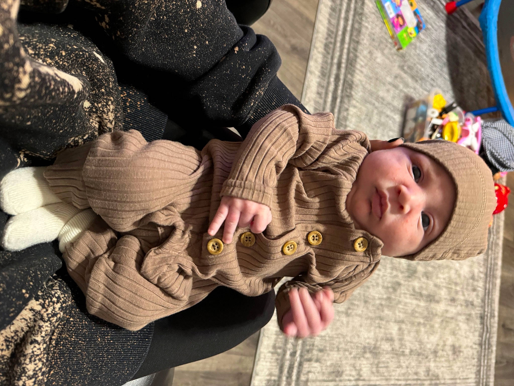 Bentley is registered to the contest to win money with this photo: baby, baby_products, baby_toddler_clothing, child, comfort, fun, grass, happy, headgear, headwear, pattern, person, play, sitting, skin, toddler, tree, vacation, wood