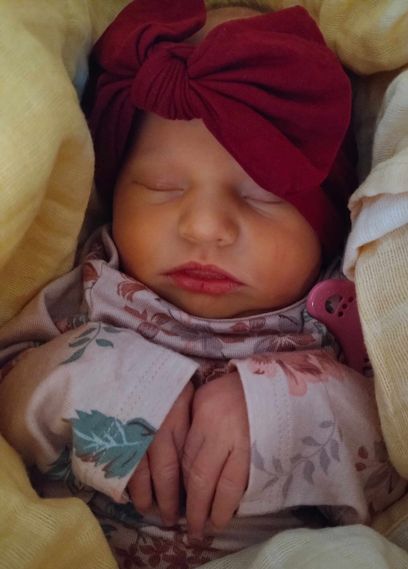 Evie joined the competition — help win amazing prizes! newborn, baby, sleeping, headband, bow, hands, wrapped, blanket, cozy, infant, soft, cute, face, clothing, pink, yellow, peaceful, portrait, toddler, closeup