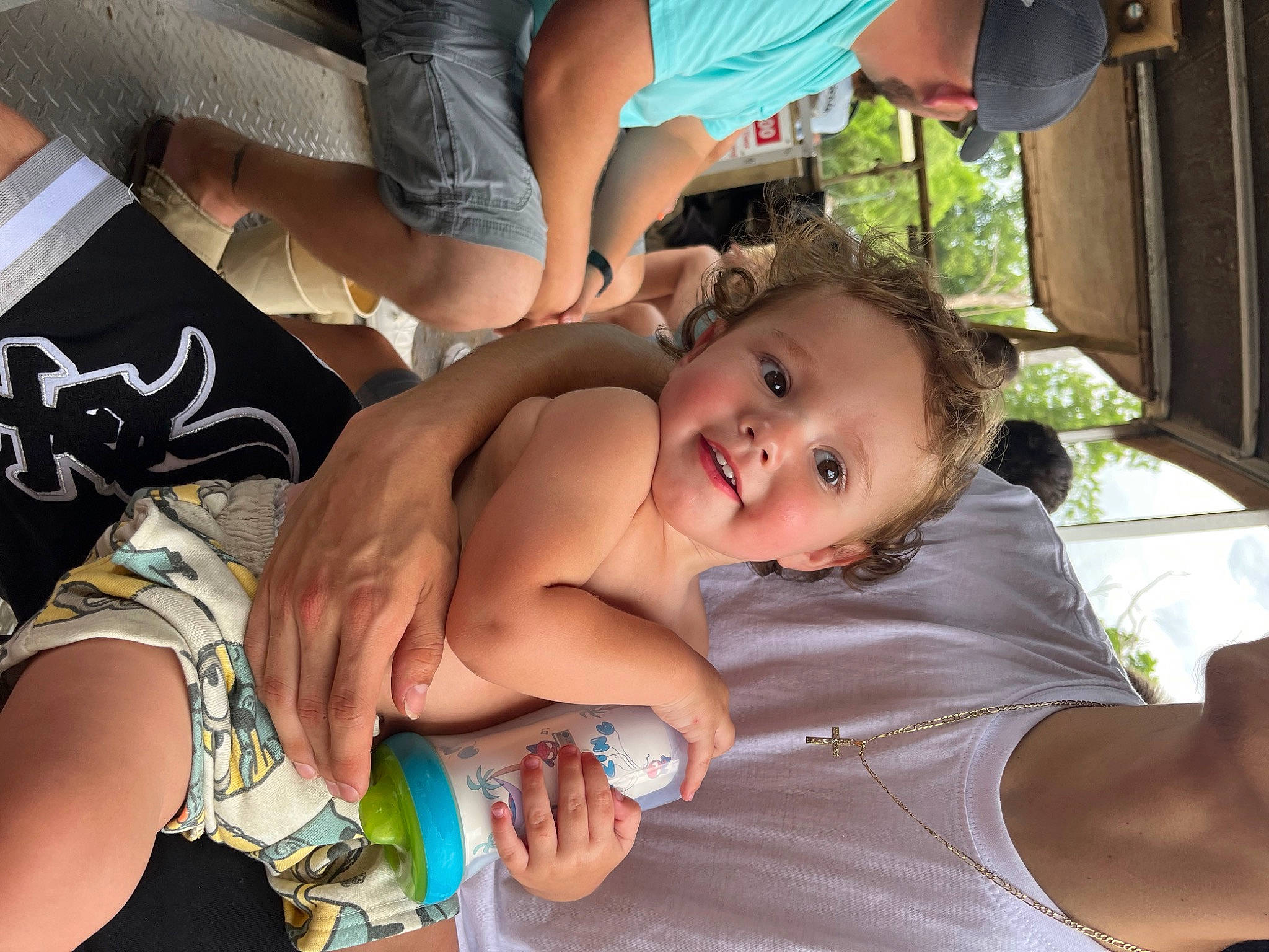 Jody is registered to the contest to win money with this photo: abdomen, arm, baby, chair, chest, event, finger, fun, happy, joint, joy, leisure, mouth, muscle, person, sharing, shorts, smile, summer, thigh