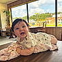 Selah joined the competition — help win amazing prizes! baby, blanket, bright_eyes, casual, chair, child, clothing, cute, daylight, face, happy, indoor, infant, person, rustic, smiling, soft_light, table, window, wooden_furniture