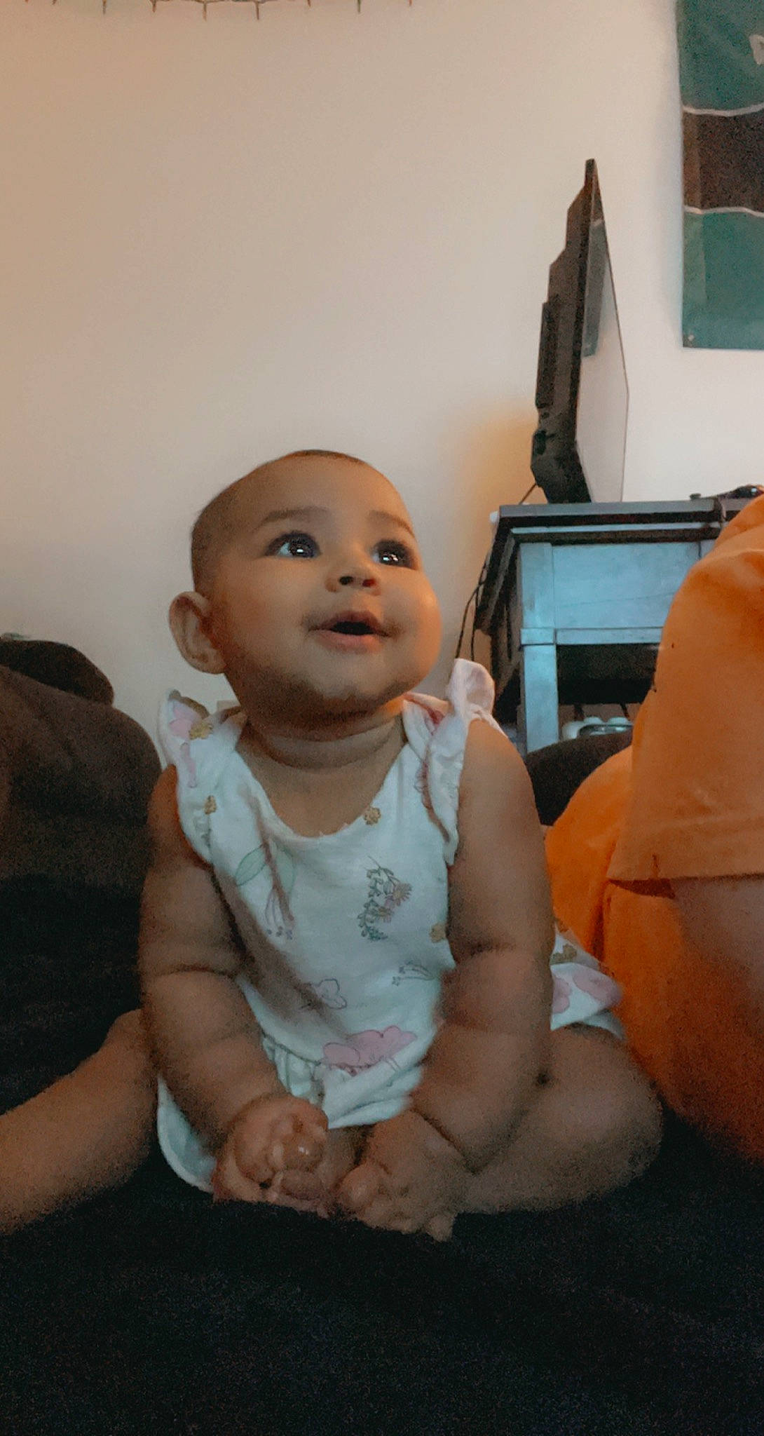 Nyla joined the competition — help win amazing prizes! abdomen, baby, baby_toddler_clothing, child, comfort, couch, finger, flooring, fun, happy, home_appliance, living_room, person, room, shoulder, sitting, smile, television, television_set, toddler