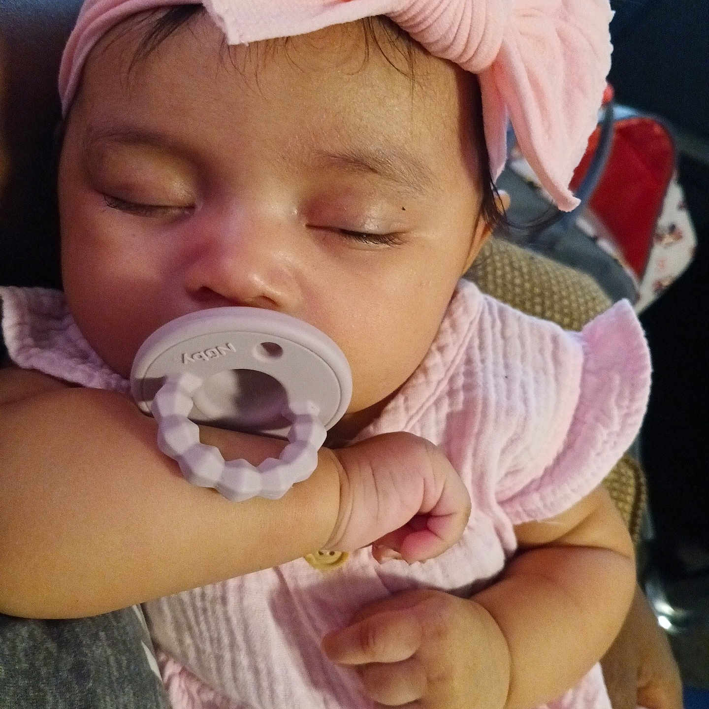 Mileah joined the competition — help win amazing prizes! adorable, arm, baby, child, closeup, cute, face, hand, headband, indoor, infant, newborn, pacifier, peaceful, person, pink_clothing, resting, sleeping, soft_texture, toddler