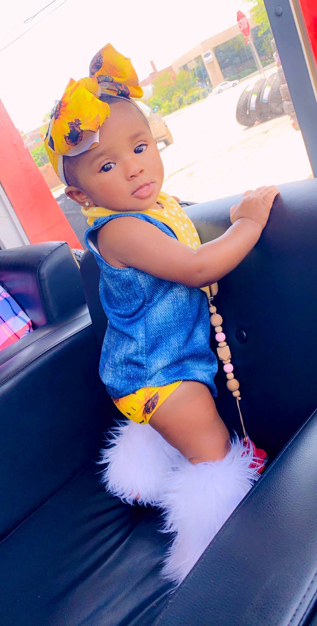 Fallon joined the competition — help win amazing prizes! auto_part, baby, child, child_model, electric_blue, headwear, luxury_vehicle, person, toddler, yellow