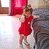 toddler, child, red_dress, bow, headband, smile, indoor, blanket, bed, curtain, floor, radiator, window, door, white_shoes, happy, pose, person, home, cozy