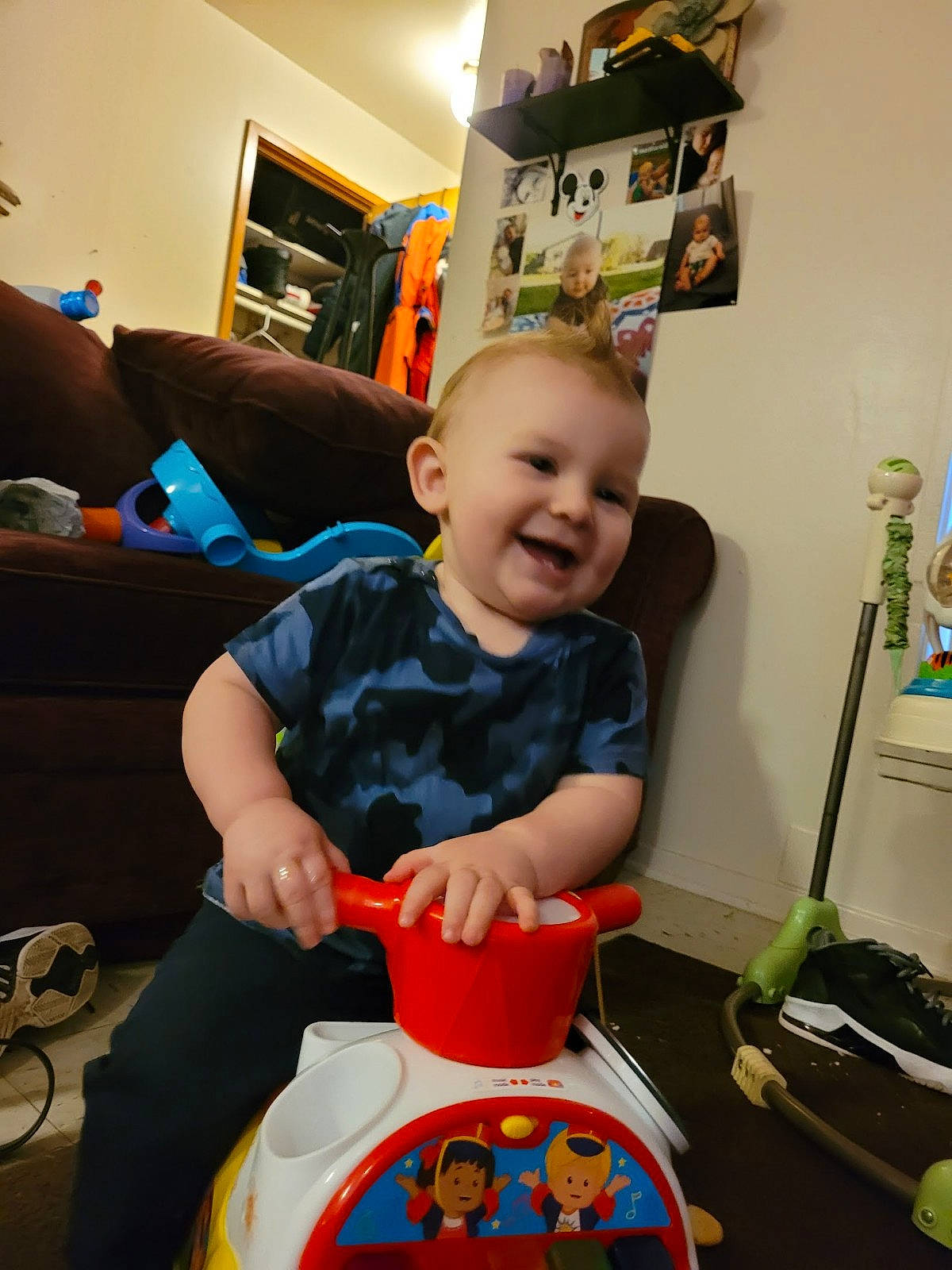 Damien joined the competition — help win amazing prizes! baby, baby_products, baby_toddler_clothing, baby_toys, child, cleanliness, couch, flooring, fun, joy, luggage_and_bags, person, picture_frame, plastic, play, riding_toy, room, sitting, smile, t_shirt