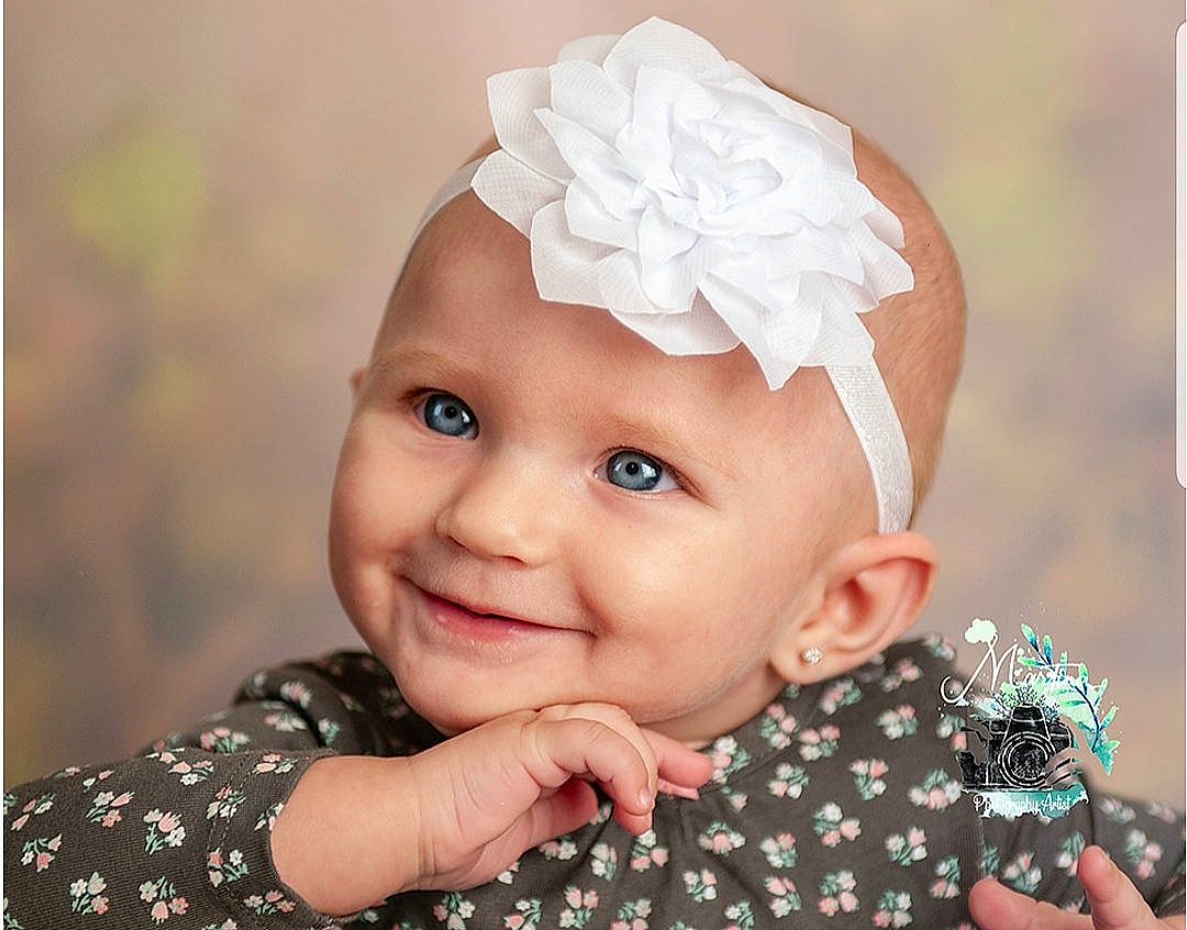 Daisy-mae is registered to the contest to win money with this photo: baby, bonnet, child, child_model, clothing, costume_accessory, design, ear, fashion_accessory, hair_accessory, happy, head, headband, headgear, headpiece, joy, pattern, person, photography, portrait_photography