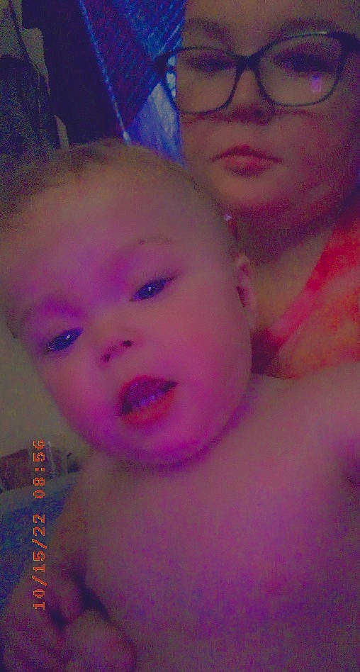 Kinslee is registered to the contest to win money with this photo: cheek, chin, ear, eye, eyebrow, eyelash, face, forehead, hairstyle, happy, head, jaw, lip, mouth, neck, nose, organ, person, purple, skin