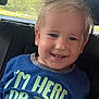 Mark joined the competition — help win amazing prizes! child, toddler, smiling, blond_hair, blue_shirt, car_interior, seat, window, outside, greenery, daylight, portrait, happy, casual_clothing, young_child, face, person, seatbelt, car_seat, indoors
