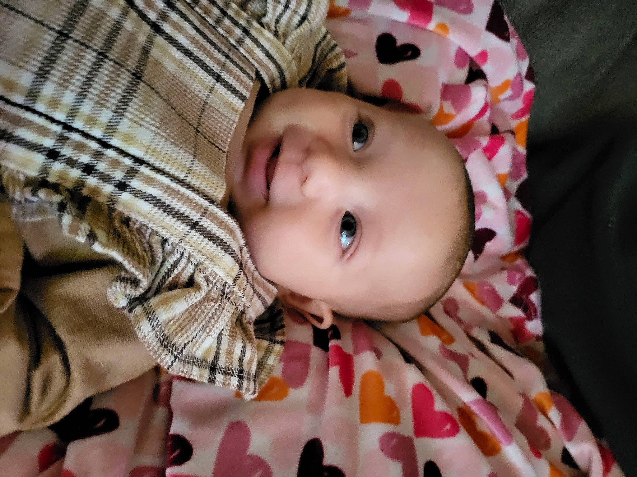 Priya joined the competition — help win amazing prizes! baby, baby_toddler_clothing, cheek, child, chin, eye, eyelash, happy, head, iris, lip, nose, pattern, person, pink, plaid, skin, sleeve, textile, toddler