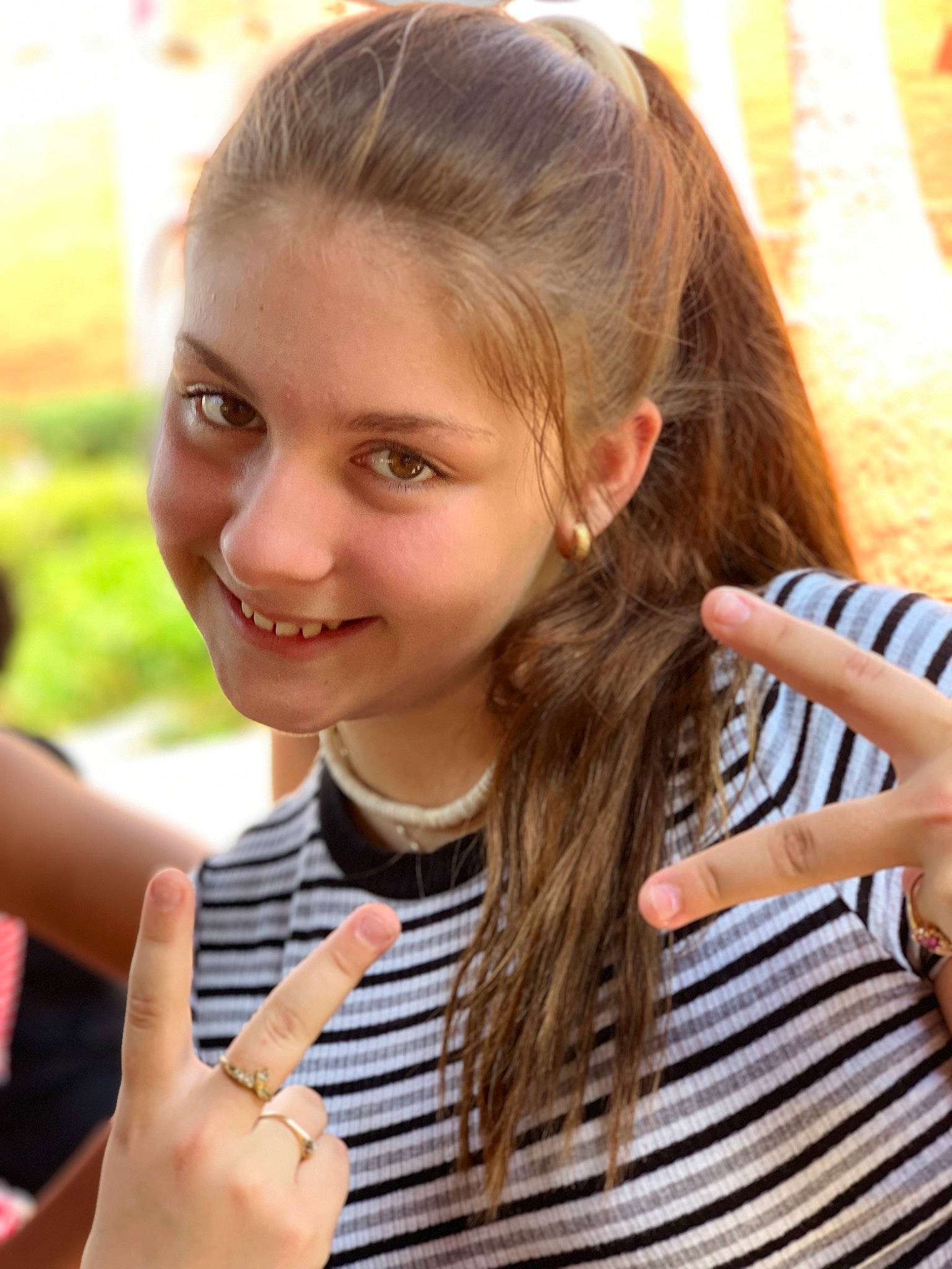 Jaydalyn is registered to the contest to win money with this photo: beauty, blond, brown_hair, child, child_model, ear, fashion_accessory, finger, gesture, hair, hairstyle, hand, joy, long_hair, neck, person, smile