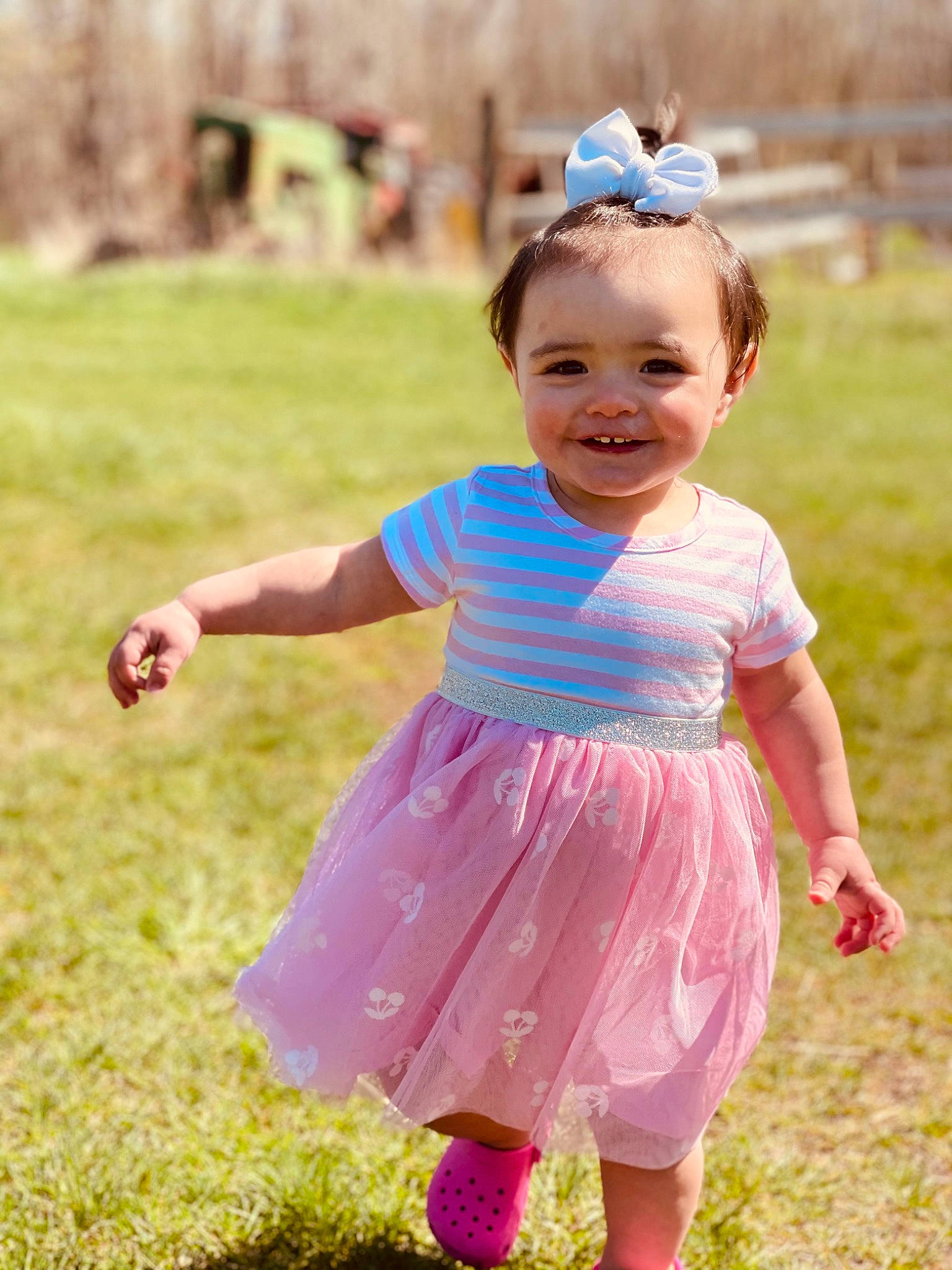 Jacqueline joined the competition — help win amazing prizes! baby_toddler_clothing, child, clothing, eye, face, fun, gesture, grass, grassland, happy, joy, magenta, meadow, people_in_nature, person, pink, plant, sleeve, smile, summer