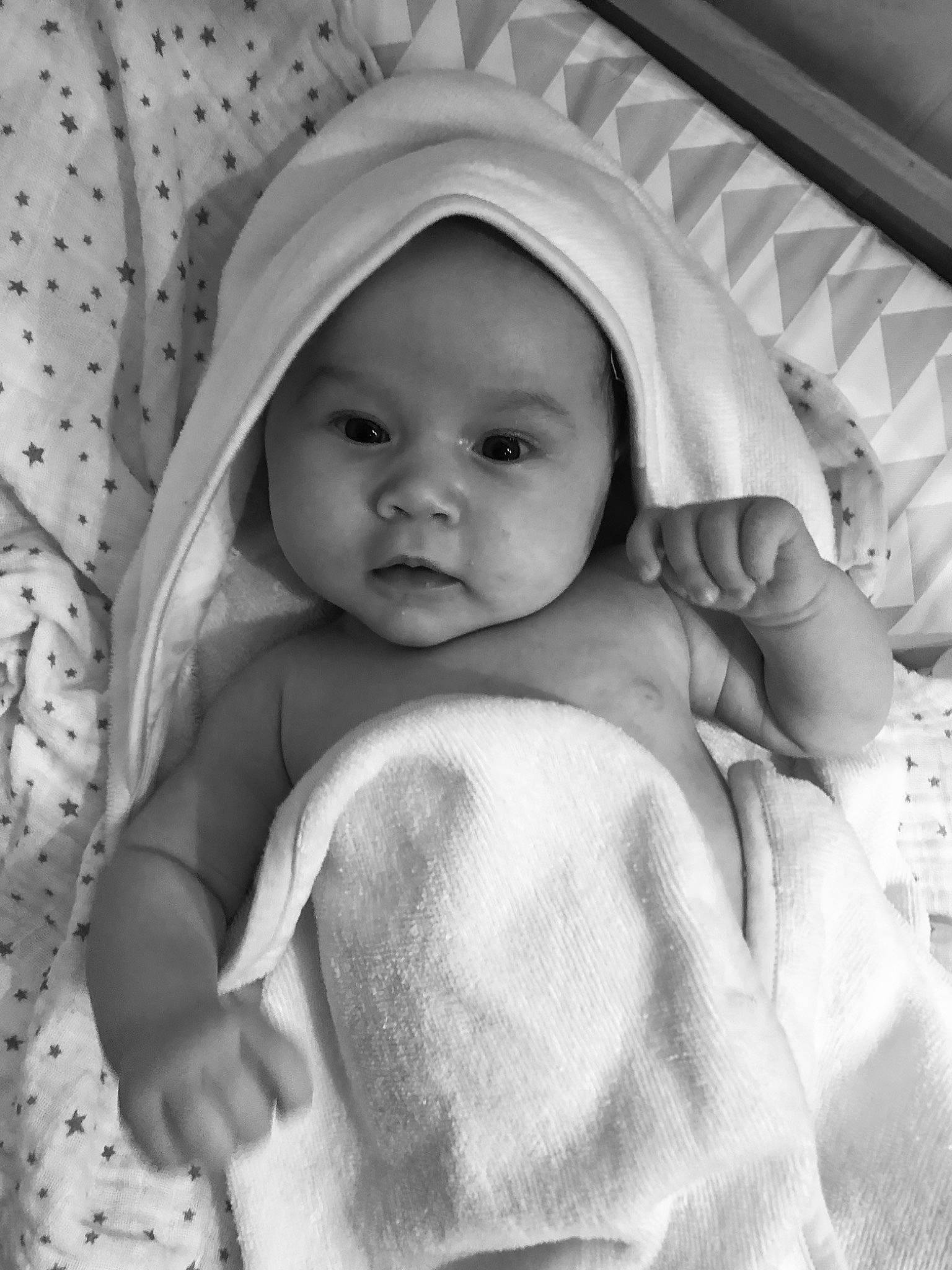 Capucine participe au concours pour gagner de l'argent avec cette photo : baby, cheek, child, chin, comfort, eyebrow, face, happy, headwear, iris, linens, lip, monochrome, mouth, nose, person, photograph, product, skin, sleeve