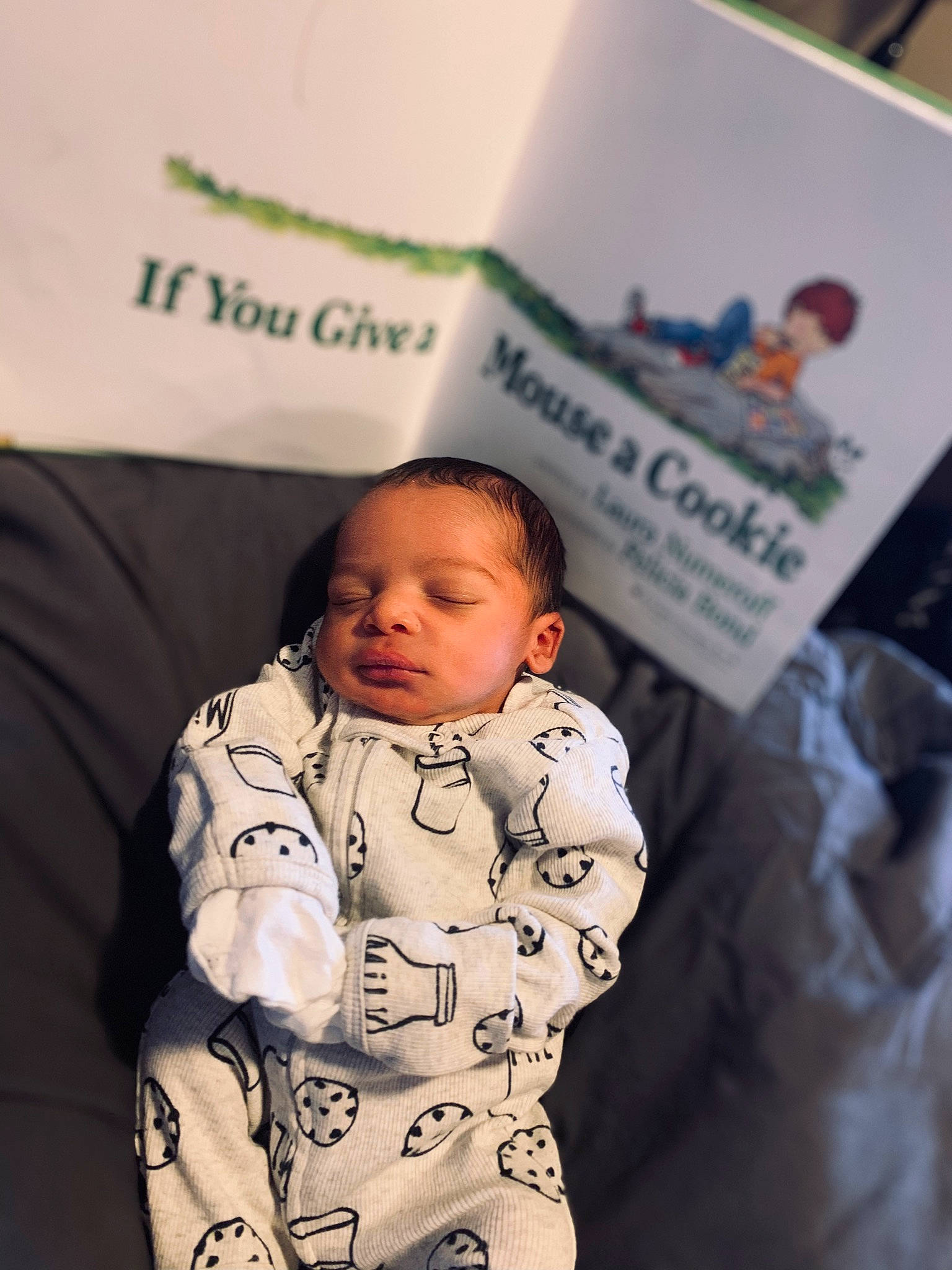 Jacob is registered to the contest to win money with this photo: baby, baby_products, baby_safety, baby_sleeping, baby_toddler_clothing, bedtime, cheek, child, comfort, font, fun, fur, happy, linens, person, room, sitting, sleeve, textile, toddler