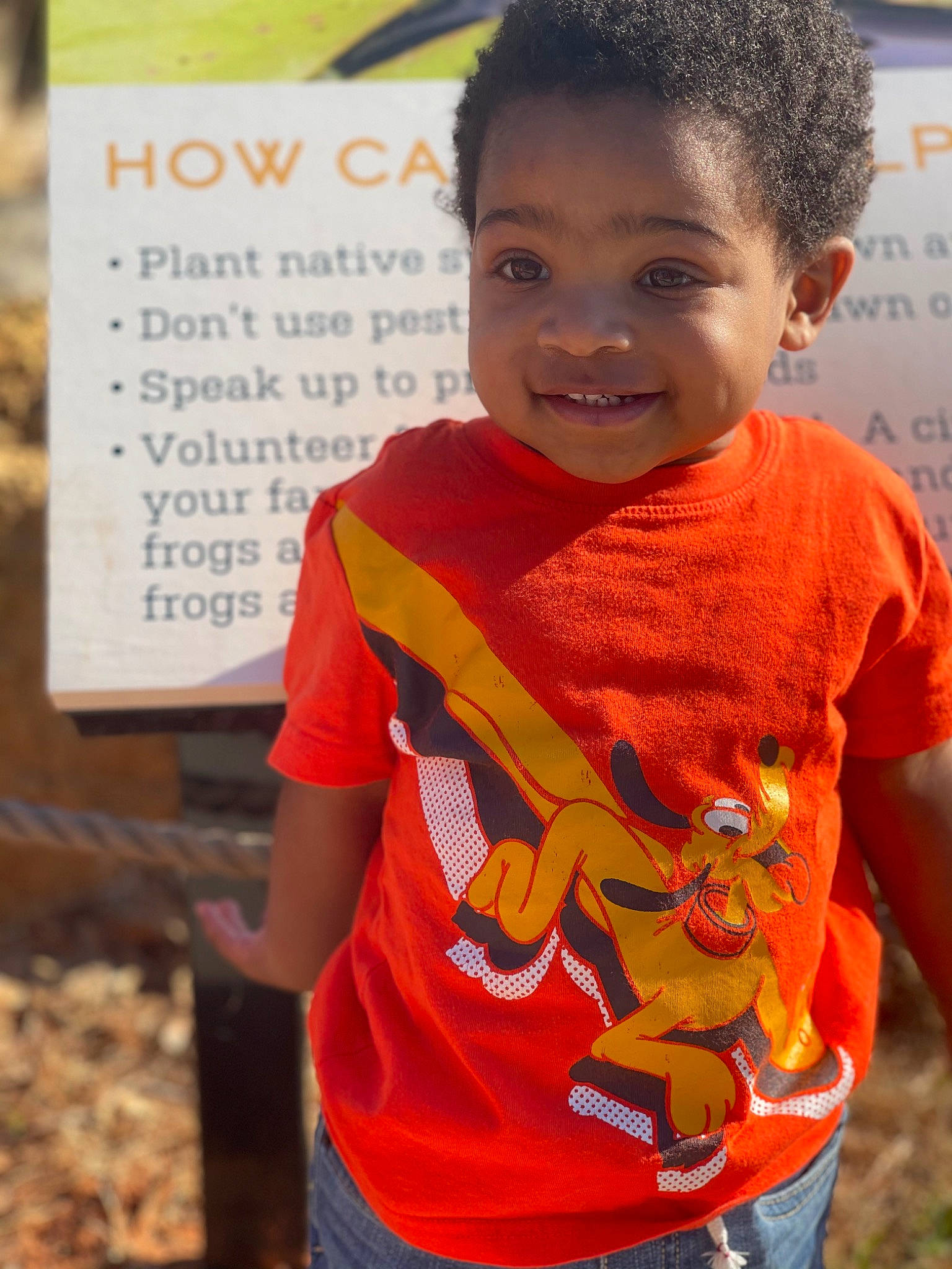 Amir is registered to the contest to win money with this photo: adaptation, child, chin, clothing, eye, forehead, fun, hairstyle, happy, head, human, joy, leisure, neck, person, skin, sleeve, smile, soil, t_shirt