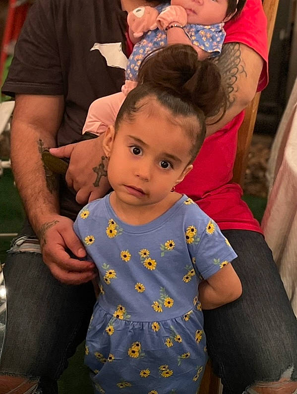 Emmalyn is registered to the contest to win money with this photo: baby, baby_toddler_clothing, chair, child, community, event, fun, gesture, hairstyle, happy, jewellery, joint, people, person, purple, recreation, sitting, skin, t_shirt, toddler