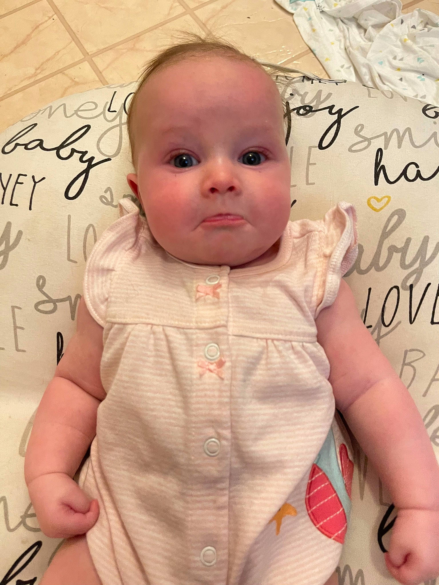 Kairi is registered to the contest to win money with this photo: baby, baby_toddler_clothing, cheek, child, chin, eyebrow, eyelash, finger, forehead, gesture, hairstyle, happy, neck, nose, person, pink, product, skin, sleeve, textile