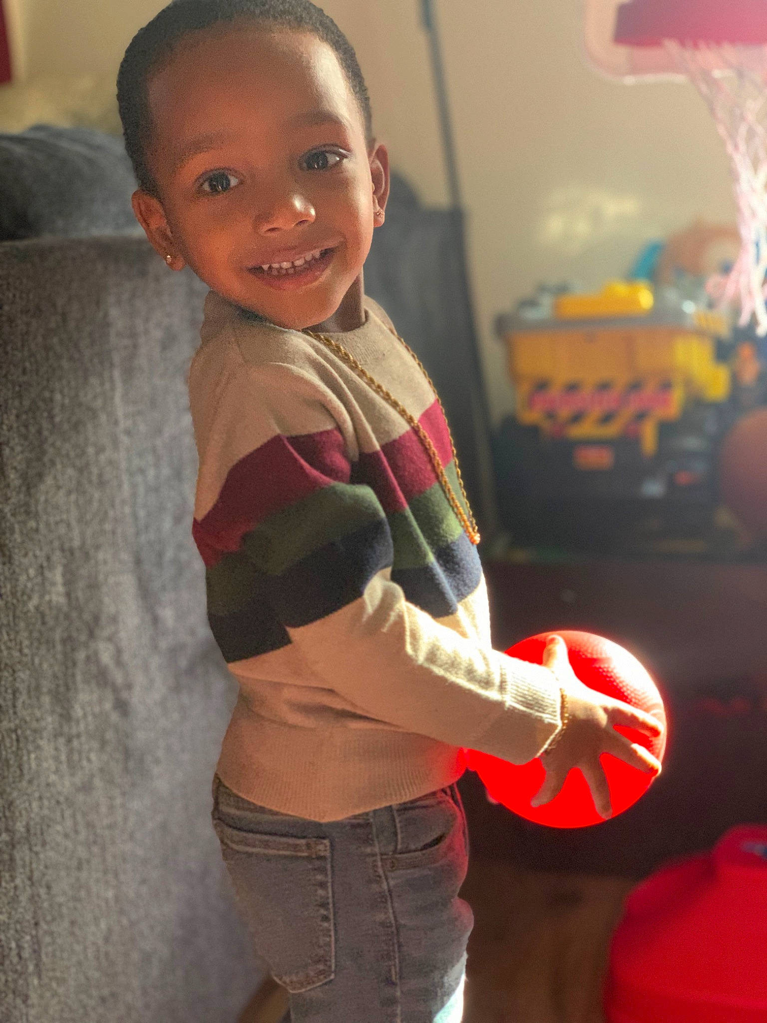 Donald is registered to the contest to win money with this photo: baby_toddler_clothing, chest, cool, finger, fun, hairstyle, happy, head, human_body, jeans, joint, joy, mouth, neck, person, shoulder, sleeve, smile, stomach, thigh