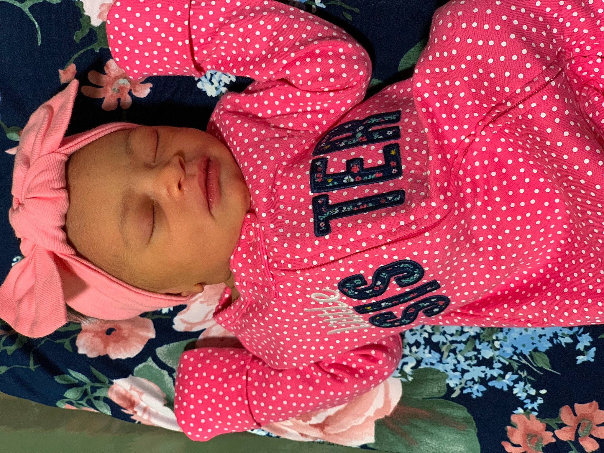 Azariah is registered to the contest to win money with this photo: art, baby, baby_products, baby_toddler_clothing, carmine, cheek, child, comfort, creative_arts, happy, headwear, linens, pattern, person, petal, plaid, product, red, sleeve, toddler