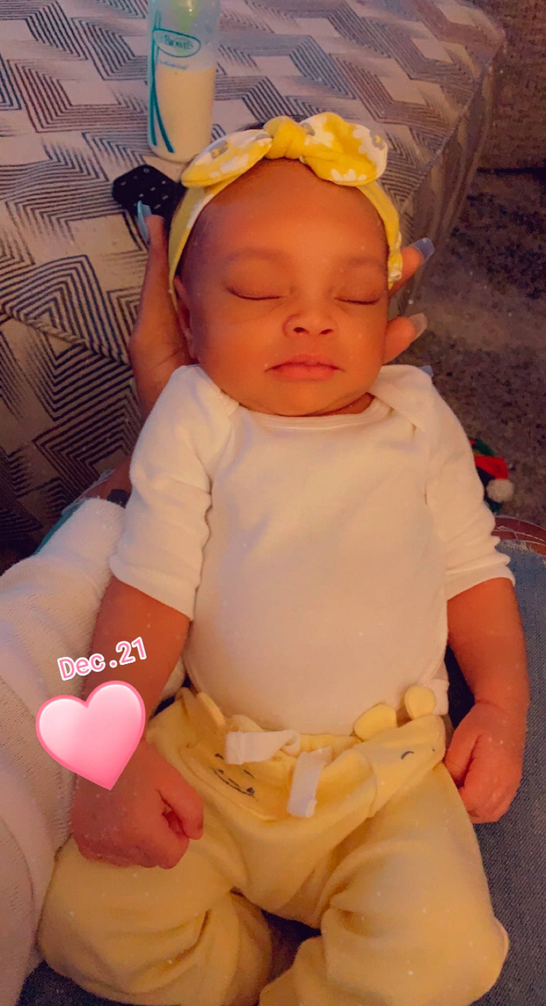 Azariah is registered to the contest to win money with this photo: baby, baby_toddler_clothing, cheek, facial_expression, finger, happy, lip, mouth, nose, orange, organ, person, pink, skin, sleeve, textile, thigh, thumb, toddler, white