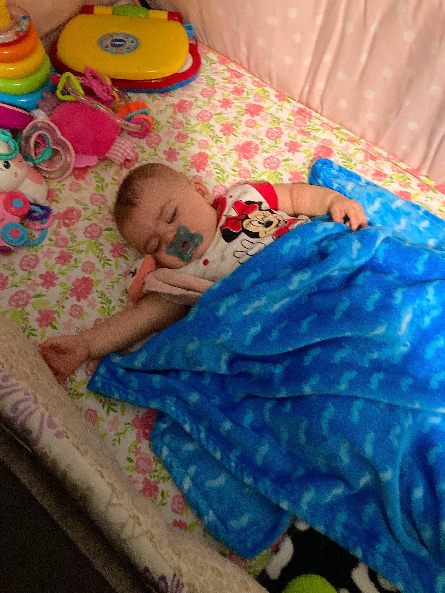 Emma joined the competition — help win amazing prizes! baby, baby_products, baby_toddler_clothing, bed, bed_sheet, bedding, bedtime, child, comfort, electric_blue, linens, pattern, person, pink, play, product, quilt, room, sitting, textile