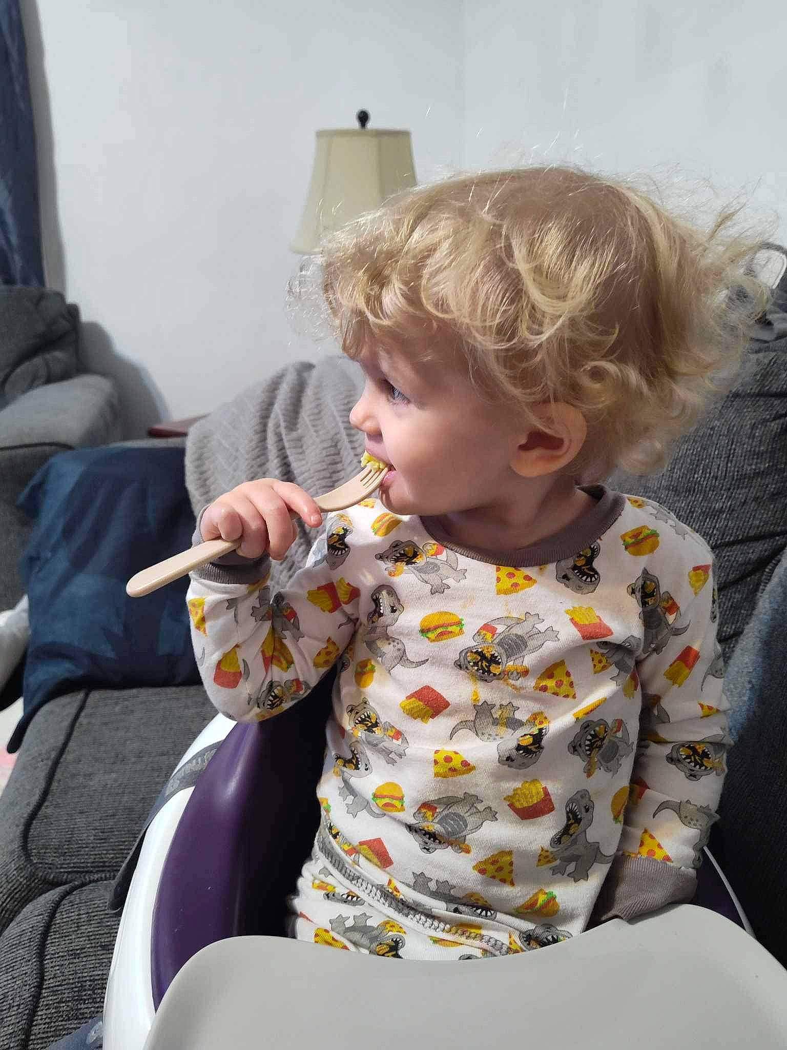Abriella is registered to the contest to win money with this photo: baby, baby_products, baby_toddler_clothing, blond, chair, child, comfort, comfort_food, curtain, eating, fun, lap, pattern, person, play, sitting, sleeve, t_shirt, tableware, toddler