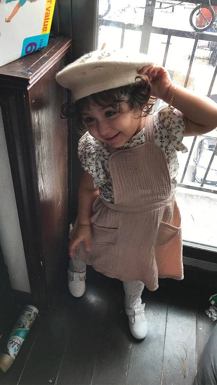 Alison is registered to the contest to win money with this photo: child, hat, headgear, joy, person, sun_hat, toddler