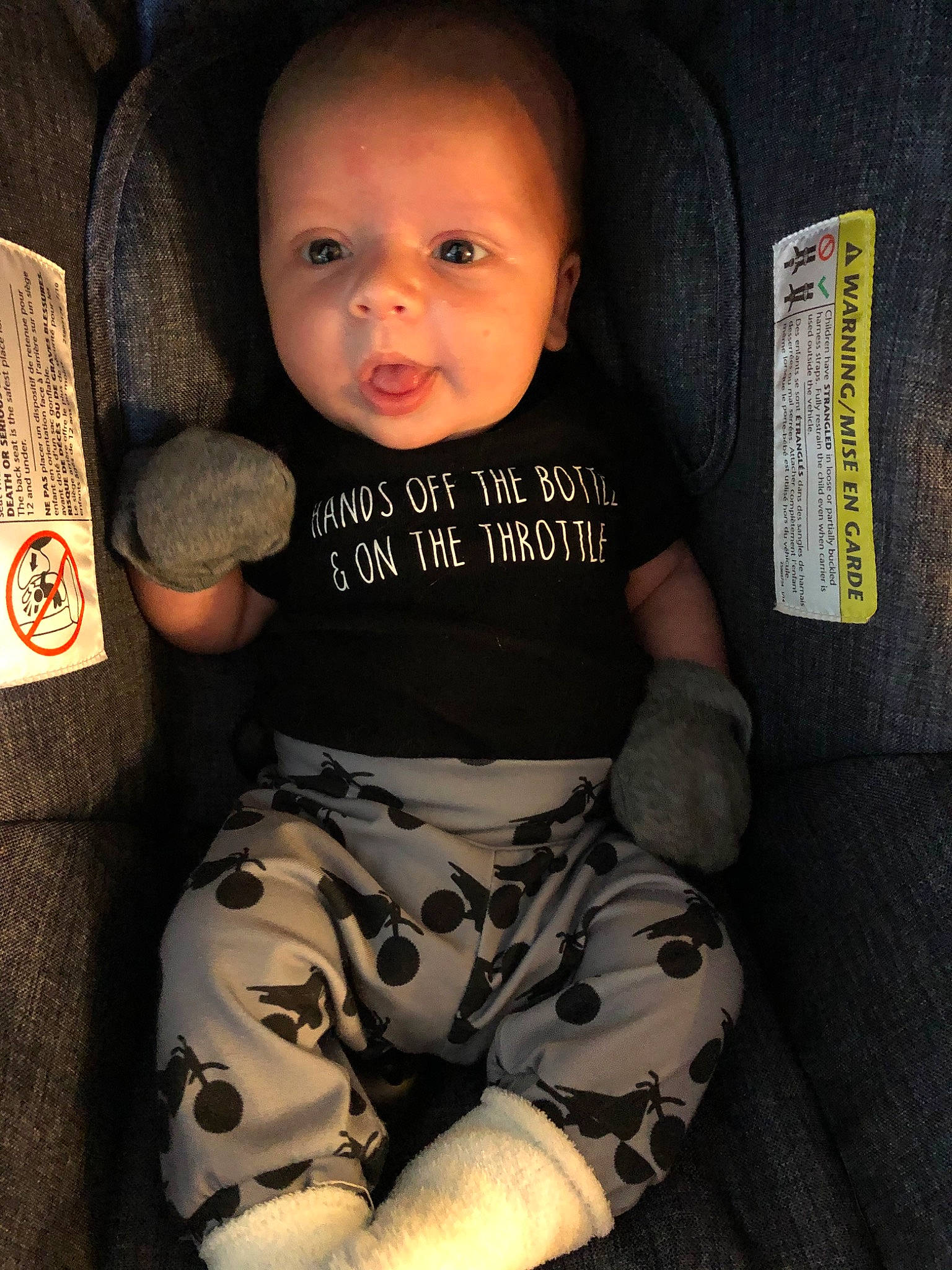 Stetson is registered to the contest to win money with this photo: baby, baby_toddler_clothing, cheek, child, person, sitting, smile, t_shirt, toddler