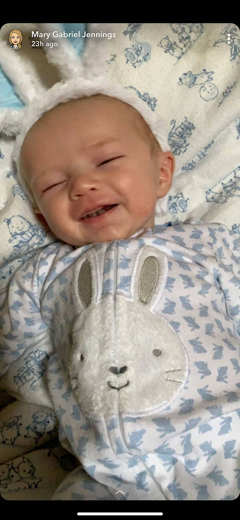 Tom is registered to the contest to win money with this photo: baby, bedtime, beige, blanket, child, domestic_rabbit, ear, head, headwear, nose, person, rabbit, skin, textile, toddler