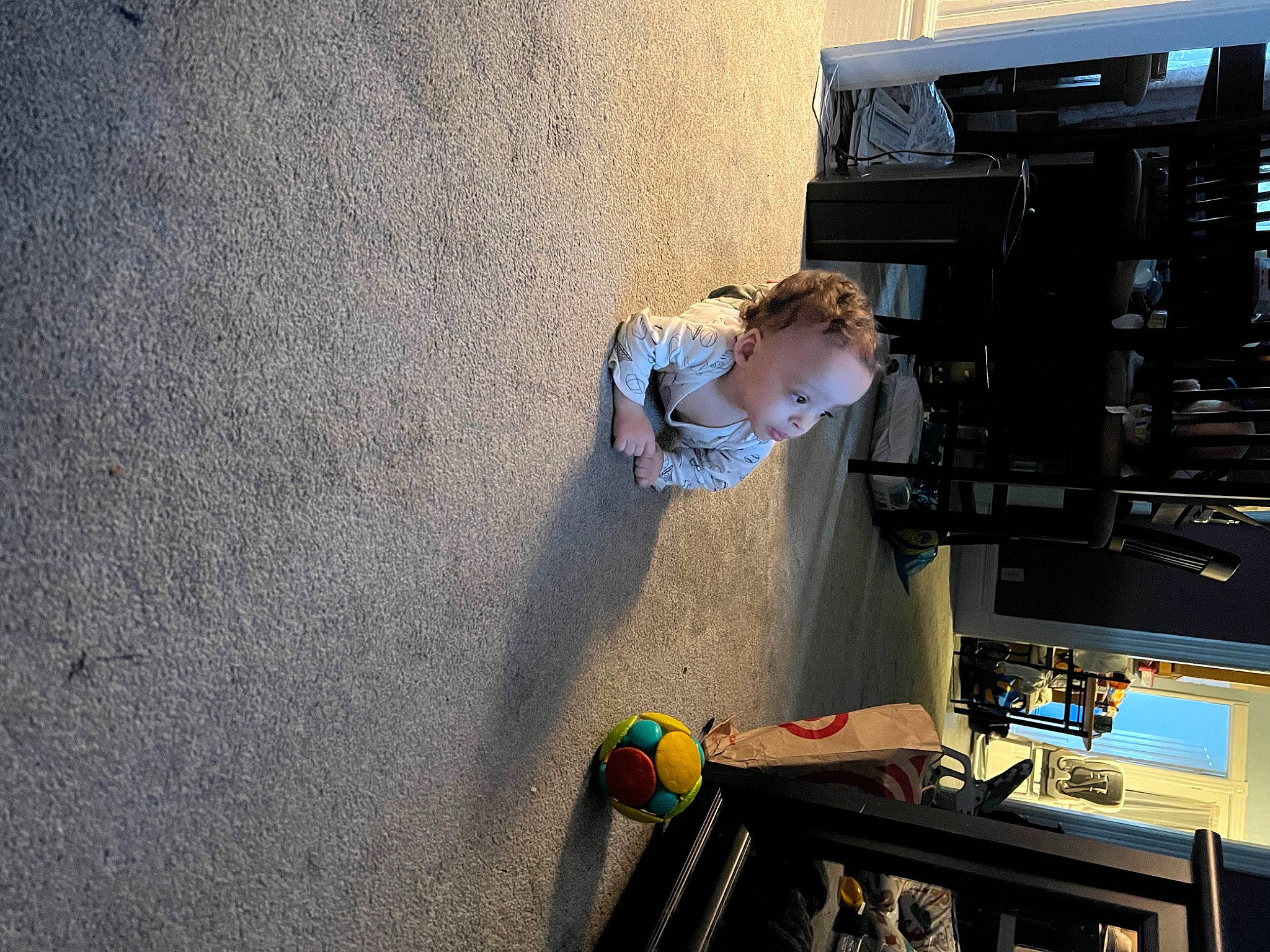 Landyn is registered to the contest to win money with this photo: asphalt, audio_equipment, child, concrete, engineering, flooring, fun, leisure, machine, person, road_surface, shadow, t_shirt, toddler, visual_arts