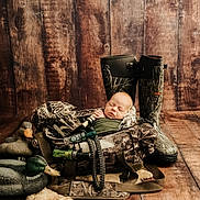Rowen joined the competition — help win amazing prizes! animal, baby, baseball, baseballglove, bird, chair, clothing, couch, face, footwear, furniture, glove, hardwood, head, pants, person, photography, portrait, shoe, wood