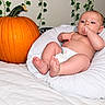 Preston Kjeldgard joined the competition — help win amazing prizes! baby, infant, child, pumpkin, autumn, halloween, diaper, bed, bedding, white_blanket, pillow, indoor, portrait, lying_down, sitting, fist, barefoot, ivy, orange, cozy