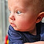 baby, child, side_profile, face, curious, blue_shirt, infant, skin, arm, closeup, natural_light, indoors, soft_light, blond_hair, expression, portrait, human, cute, young, looking_away