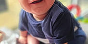 Leo joined the competition — help win amazing prizes! baby, blanket, blurred_background, child, crawling, cute, face, floor, foot, hand, happy, indoor, infant, navy_blue_clothing, portrait, skin, smiling, soft_light, toddler, window