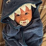 baby, infant, pacifier, towel, hood, shark_costume, blanket, bed, swaddle, cute, eyes, face, newborn, cozy, soft_texture, fabric, indoor, portrait, wrapped, sleepy