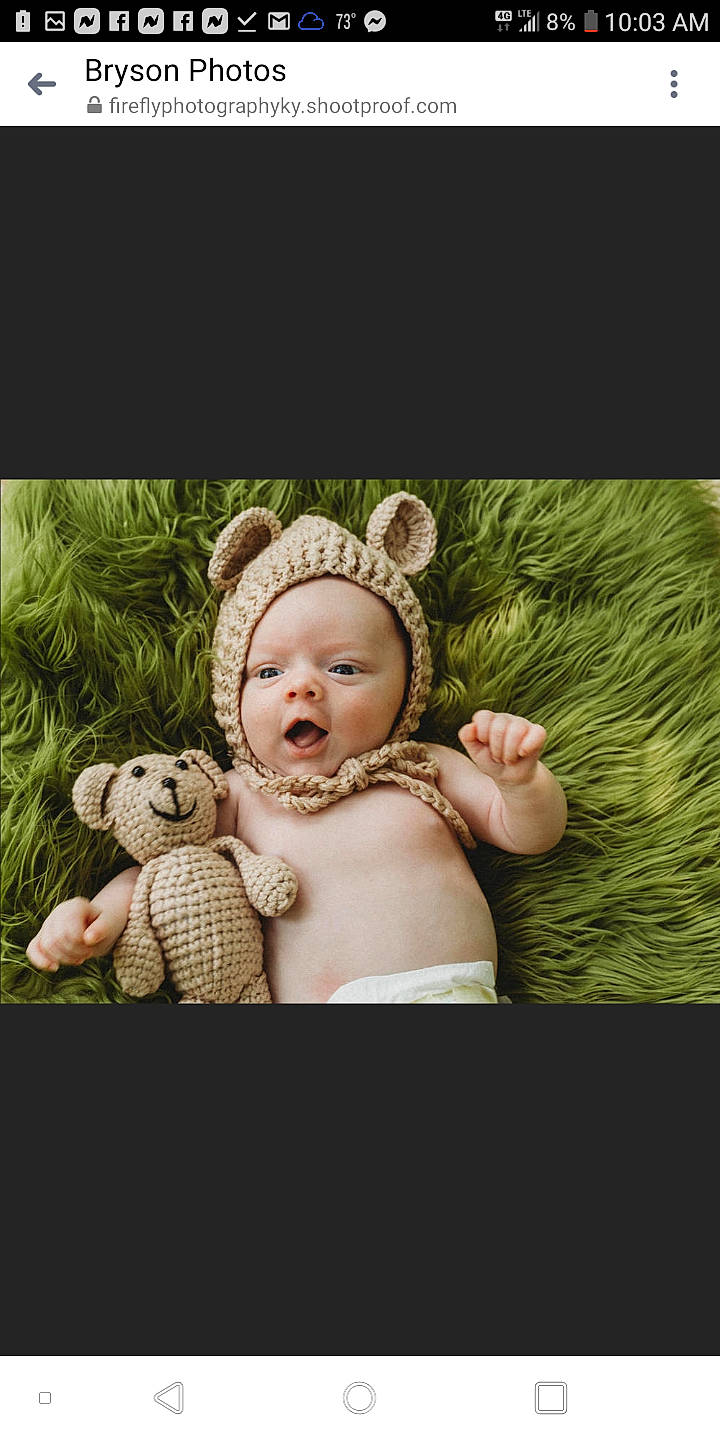 Bryson is registered to the contest to win money with this photo: baby, cheek, child, ear, fawn, grass, headwear, person, photograph, photography, stock_photography, stuffed_toy, teddy_bear, toddler, toy
