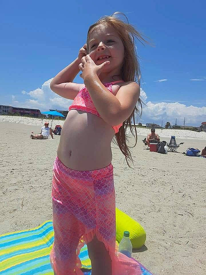 Lily is registered to the contest to win money with this photo: beach, bikini, blond, brassiere, cloud, eyewear, fun, happy, leisure, people_on_beach, person, sand, sky, smile, summer, swimsuit_top, swimwear, thigh, travel, trunk