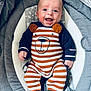Aaron participe au concours pour gagner de l'argent avec cette photo : baby, smiling, infant, striped_clothing, bear_design, baby_seat, cushion, happy, cute, apparel, child, portrait, indoor, young_child, clothing, sitting, comfort, person, face, newborn