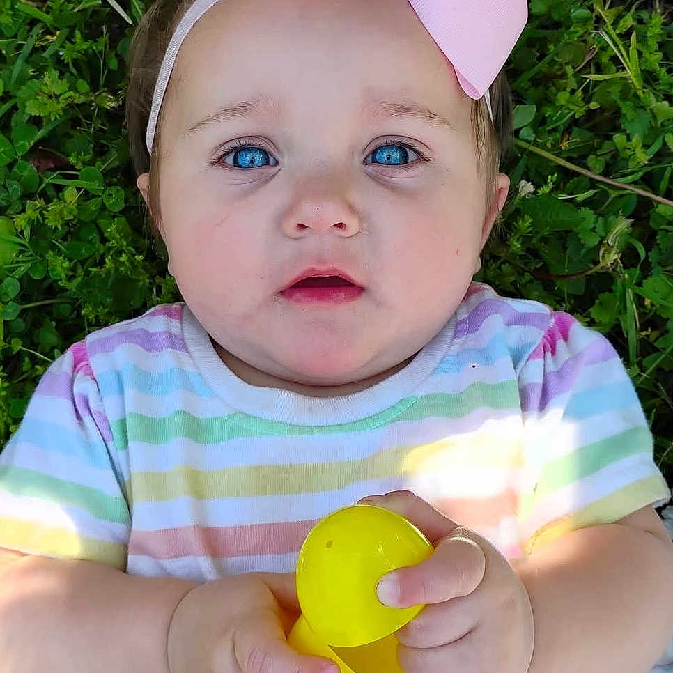 Wren joined the competition — help win amazing prizes! accessories, baby, ball, clothing, face, flower, grass, hat, head, person, petal, photography, plant, portrait, sport, t_shirt, tape, tennis, tennisball, vegetation