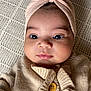 Harlow-Rae is registered to the contest to win money with this photo: baby, beanie, bonnet, cap, clothing, face, happy, hat, head, hood, hoodie, knitwear, newborn, pants, person, photography, portrait, smile, sweater, sweatshirt