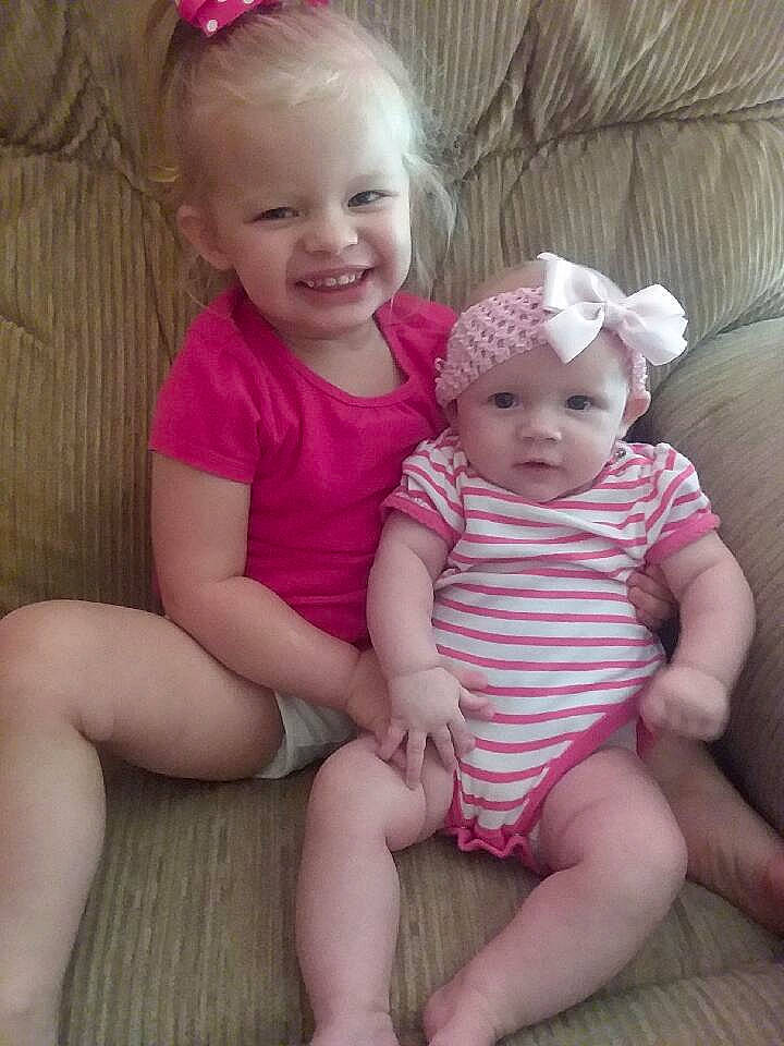 Beatrice joined the competition — help win amazing prizes! baby, baby_toddler_clothing, blond, cheek, child, cousin, daughter, family, fun, hair_accessory, iris, joy, people, person, pink, sibling, sitting, skin, smile, toddler