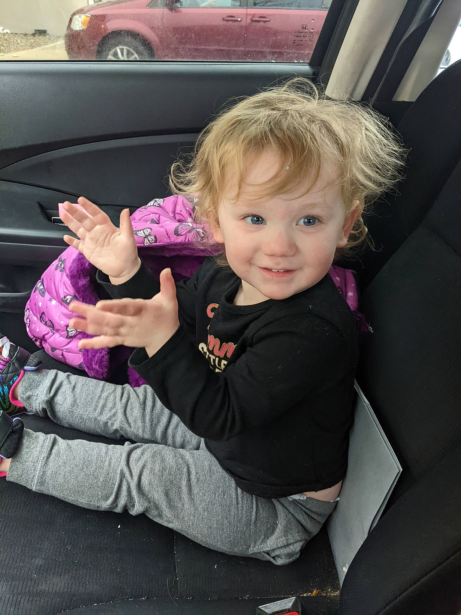 Ariel joined the competition — help win amazing prizes! auto_part, automotive_design, automotive_exterior, automotive_tire, car, face, gesture, hand, motor_vehicle, person, plant, product, smile, thumb, tire, toddler, tree, vehicle, vehicle_door, wheel