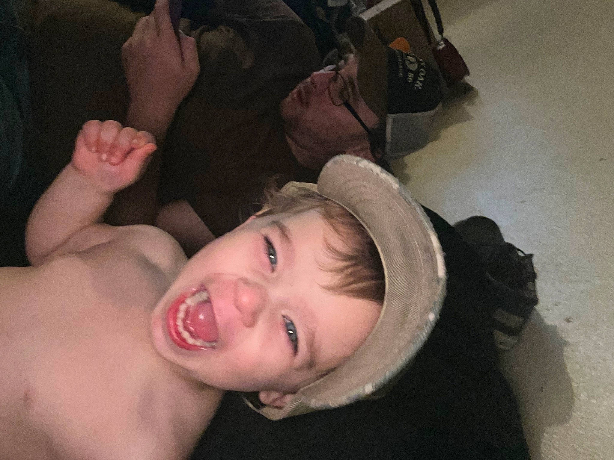 Ryan is registered to the contest to win money with this photo: bag, black_hair, camera, chest, comfort, eyelash, face, flash_photography, gesture, happy, hat, headwear, jaw, lip, luggage_and_bags, nail, person, shoulder, skin, smile