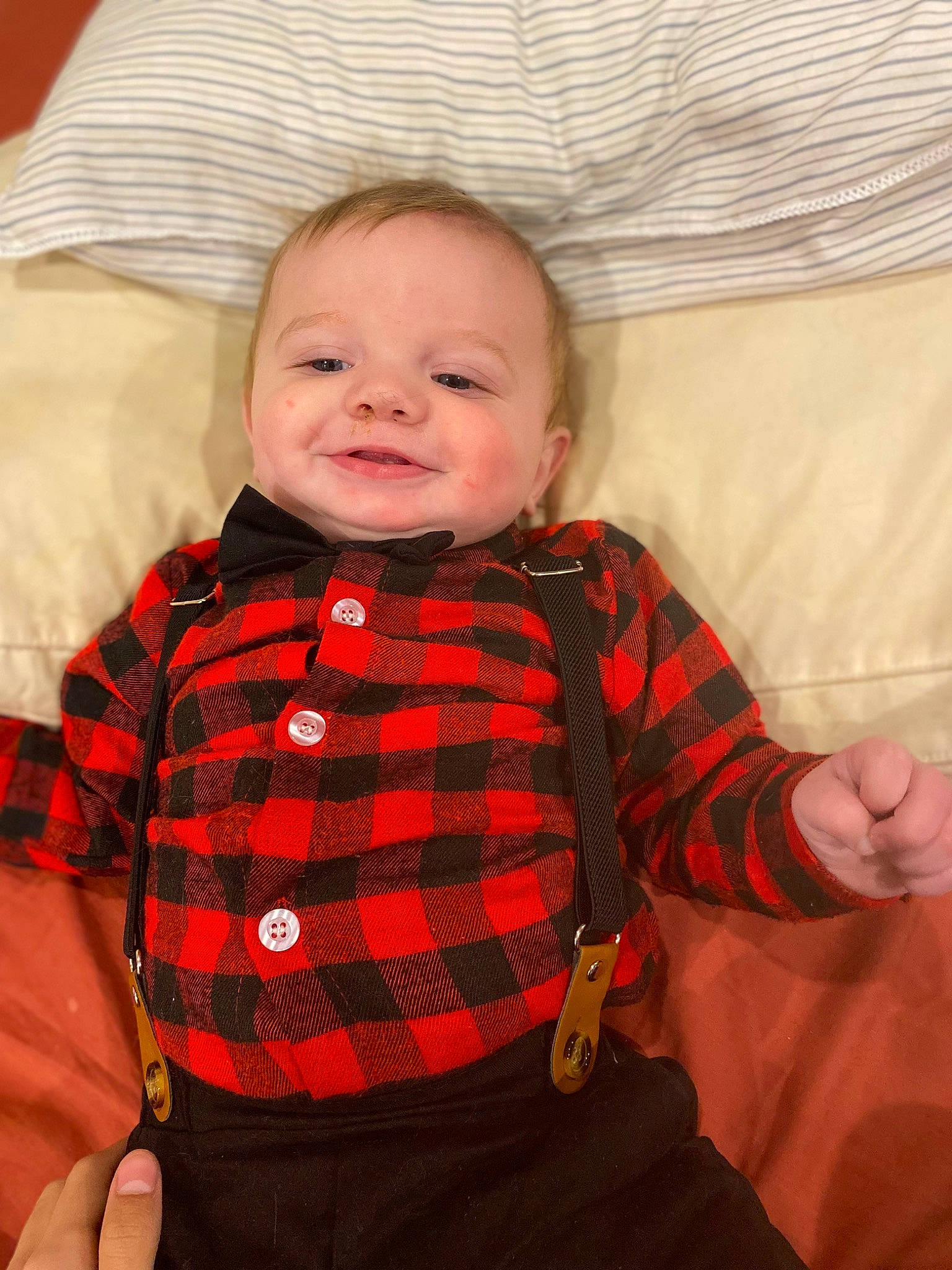 Petrus joined the competition — help win amazing prizes! baby, baby_toddler_clothing, cheek, chin, collar, comfort, eye, face, finger, gesture, head, iris, nose, outerwear, person, plaid, skin, sleeve, smile, tartan