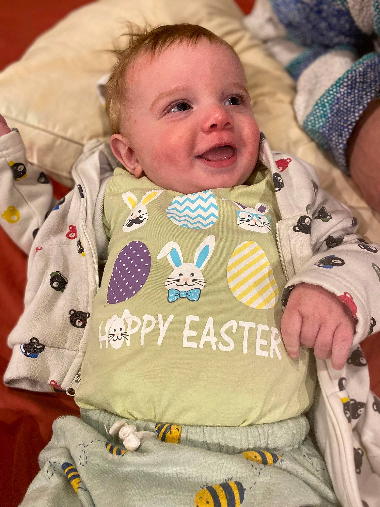 Petrus is registered to the contest to win money with this photo: baby, baby_toddler_clothing, cheek, child, collar, comfort, eye, facial_expression, happy, linens, outerwear, pattern, person, skin, sleeve, smile, t_shirt, textile, toddler, white