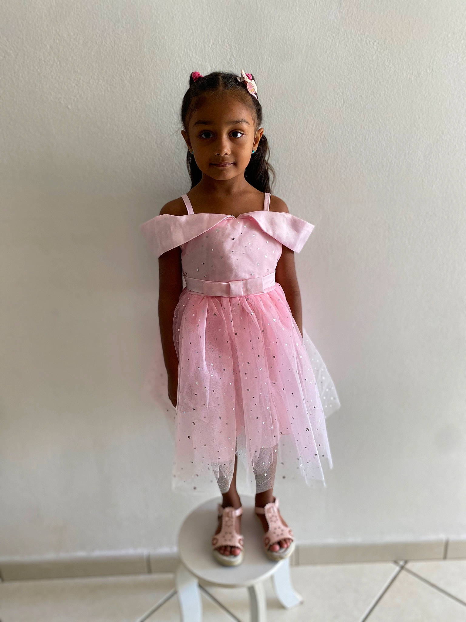 Milla Mai-lan participe au concours pour gagner de l'argent avec cette photo : arm, baby_toddler_clothing, day_dress, dress, embellishment, face, fashion_design, hair, head, leg, magenta, neck, one_piece_garment, outerwear, person, pink, shoulder, sleeve, smile, toddler