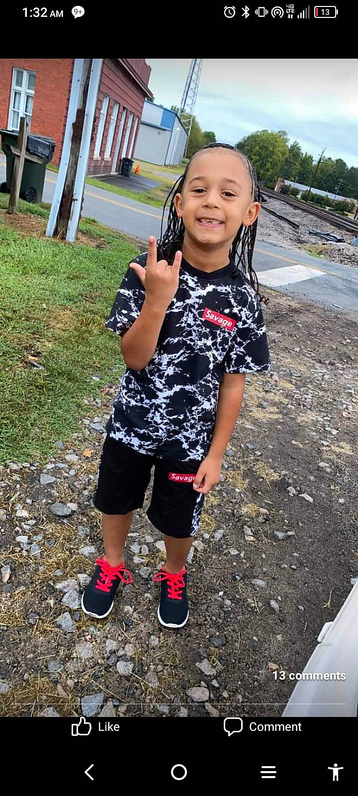 Isaiah joined the competition — help win amazing prizes! asphalt, child, fashion_accessory, fun, grass, happy, human_leg, joy, leisure, pattern, person, plant, recreation, road, sleeve, smile, soil, t_shirt, thigh, toddler