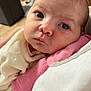 Giulyana participe au concours pour gagner de l'argent avec cette photo : baby, newborn, infant, face, eyes, blanket, clothing, pink, white, indoor, portrait, closeup, person, soft, cute, child, young, expression, gaze, human
